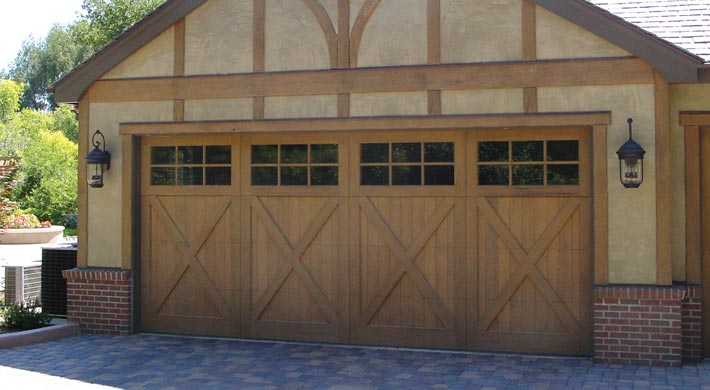 two car garage with wide panel custom wood door from amarr by design