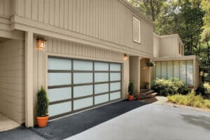 two car garage with amarr vista garage doors a specialty collection door on a modern house