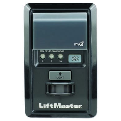 Black garage door control panel with timer and status lights, from LiftMaster