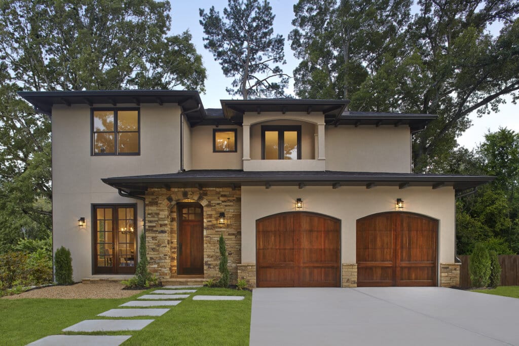 arched wooden one car garage doors