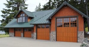 Separate garage structure with four doors from Northwest garage doors. Image for Best Garage Door Brands post.