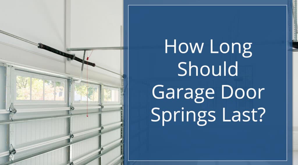 Photo of interior view of garage doors with torsion spring system for post on how long should garage door springs last.