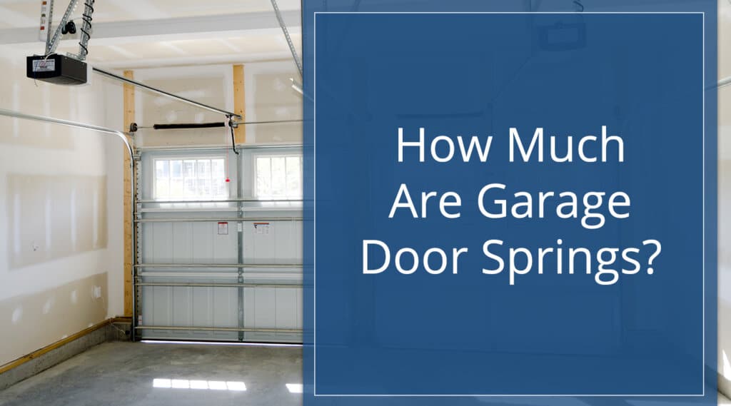 Photo of the interior of a garage with two garage doors operated with one torsion spring on each for post on how much are garage door springs.