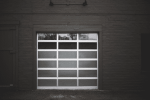 Aluminum garage door with glass panels