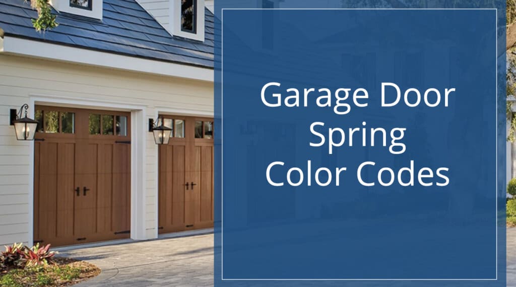 Hero image for garage door spring color codes blog with photo of the attached garage of a high-end home in the background.