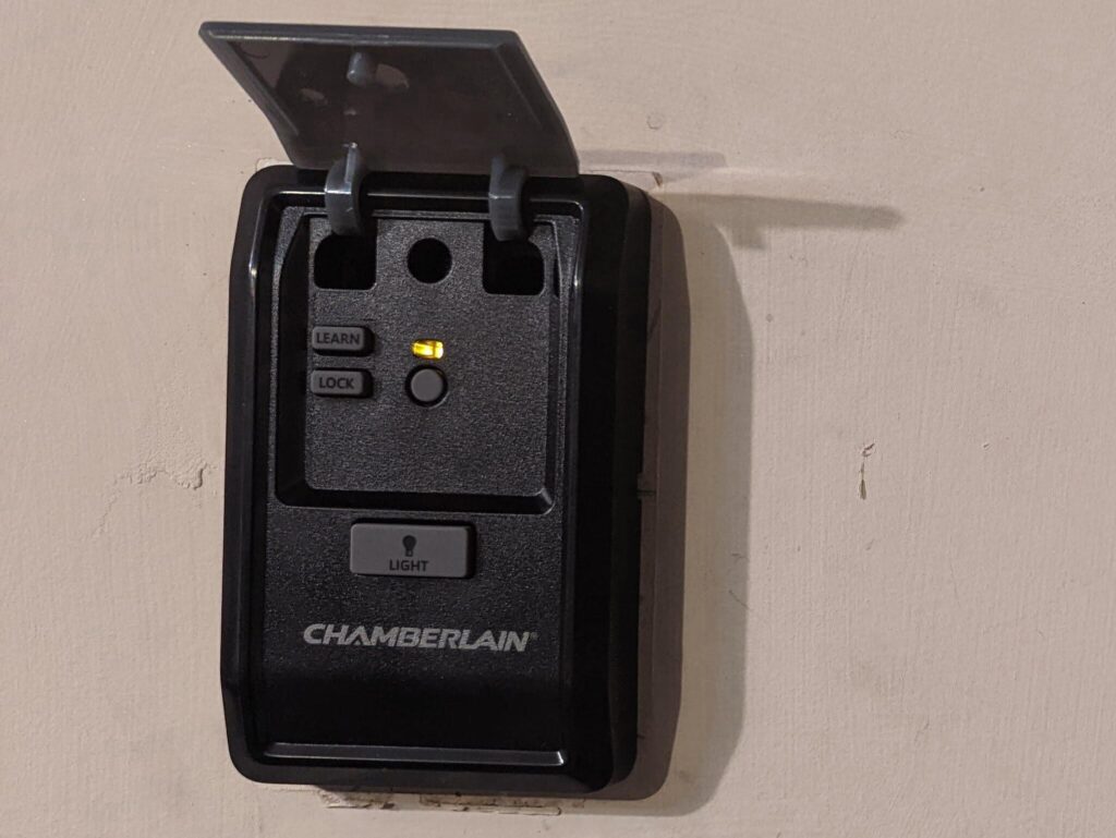 garage door opener lock button